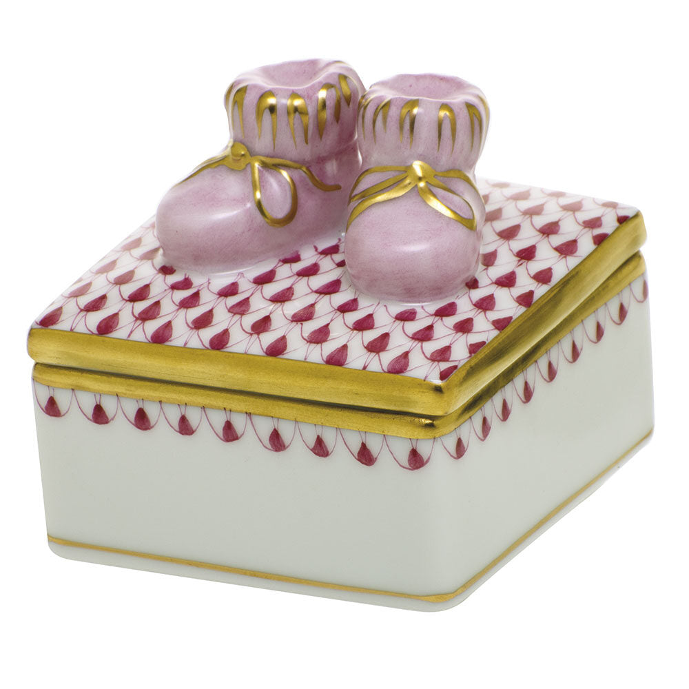 Hand-painted Herend Baby Bootie Box in Raspberry fishnet porcelain on a white background