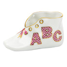 Hand-painted Herend Baby Shoe with Abc Baby Keepsake in Raspberry fishnet porcelain on a white background