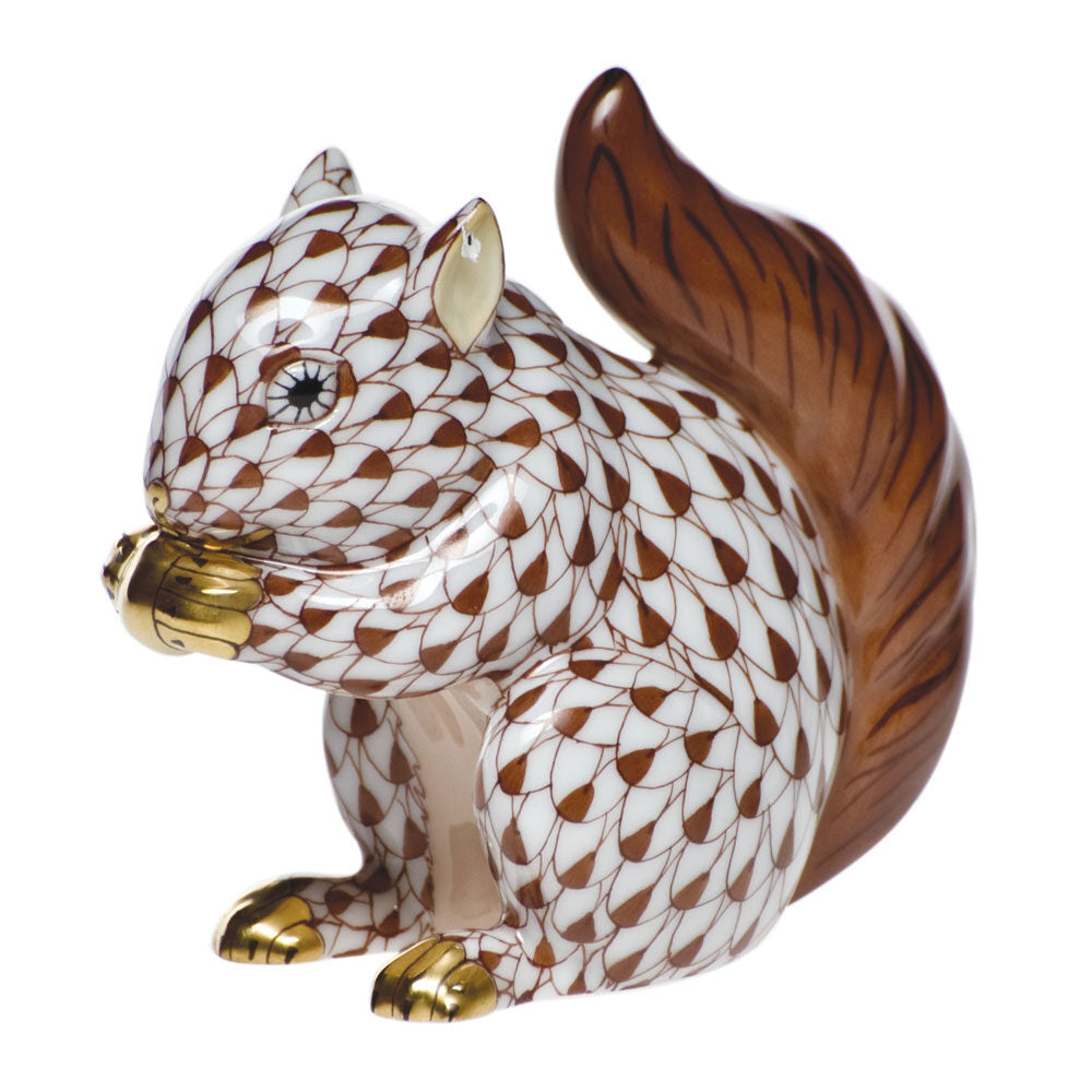 Hand-painted Herend Baby Squirrel Figurine in Chocolate fishnet porcelain on a white background