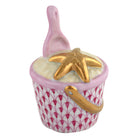 Hand-painted Herend Beach Bucket Figurine in Raspberry fishnet porcelain on a white background