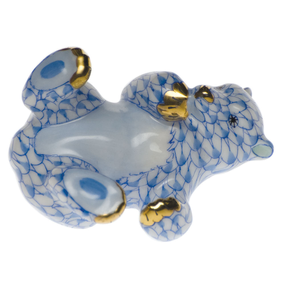 Hand-painted Herend Bear Cub Figurine in fine porcelain, 2.25in L X 1.25in H, on a white background