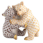Hand-painted Herend Bear Hug Figurine in Butterscotch-Chocolate fishnet porcelain on a white background
