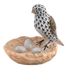 Hand-painted Herend Bird with Nest Figurine in Black fishnet porcelain on a white background