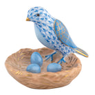 Hand-painted Herend Bird with Nest Figurine in Blue fishnet porcelain on a white background