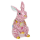 Hand-painted Herend Bunny with Christmas Lights Figurine in Raspberry fishnet porcelain on a white background