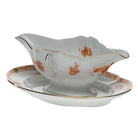 Hand-painted Herend Chinese Bouquet Rust Gravy Boat with Fixed Stand in fine porcelain, on a white background
