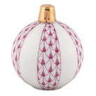 Hand-painted Herend Christmas Ornament Figurine in Raspberry fishnet porcelain on a white background