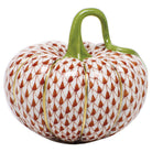 Hand-painted Herend Cinderella Pumpkin Figurine in Rust fishnet porcelain on a white background