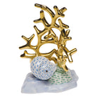 Hand-painted Herend Coral with Shells Figurine in fine porcelain, 4in L X 5in H, on a white background