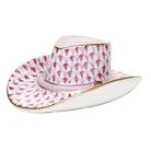 Hand-painted Herend Cowboy Hat Figurine in Raspberry fishnet porcelain on a white background