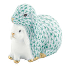 Hand-painted Herend Cuddling Bunnies Figurine in Green fishnet porcelain on a white background