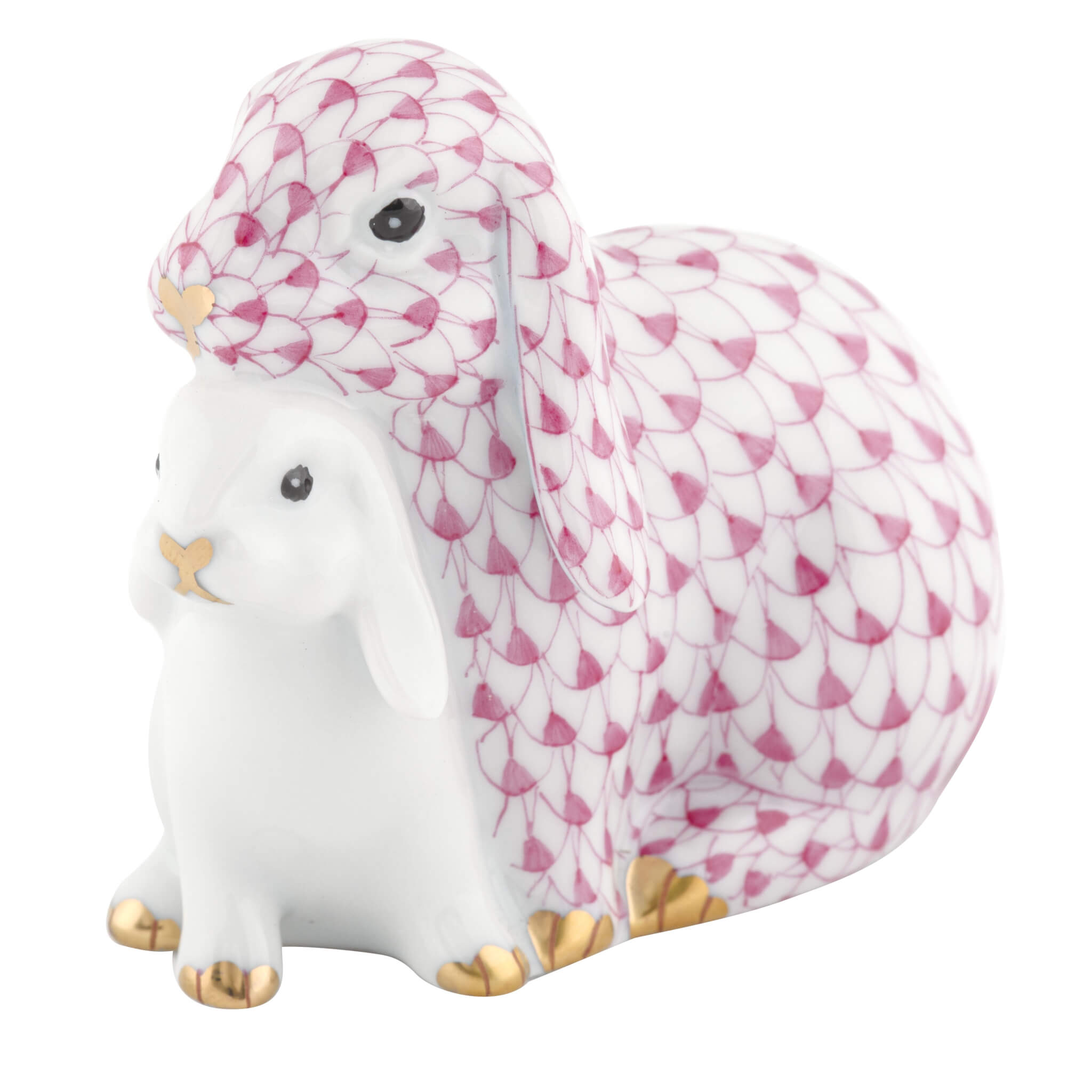 Herend Cuddling Bunnies figurine in Raspberry with raspberry pink fishnet pattern with gold accents on a white background