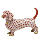 Hand-painted Herend Dachshund Figurine in Rust fishnet porcelain on a white background