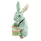 Hand-painted Herend Drummer Bunny Figurine in Key Lime fishnet porcelain on a white background