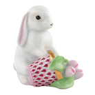 Herend Flowerpot Bunny figurine in Raspberry with raspberry pink fishnet pattern with gold accents on a white background