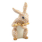 Hand-painted Herend Flute Bunny Figurine in Butterscotch fishnet porcelain on a white background