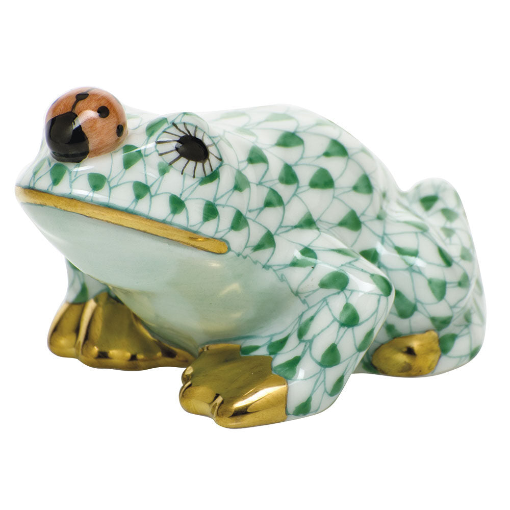Hand-painted Herend Frog with Ladybug Figurine in Green fishnet porcelain on a white background