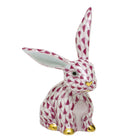 Hand-painted Herend Funny Bunny Figurine in Raspberry fishnet porcelain on a white background