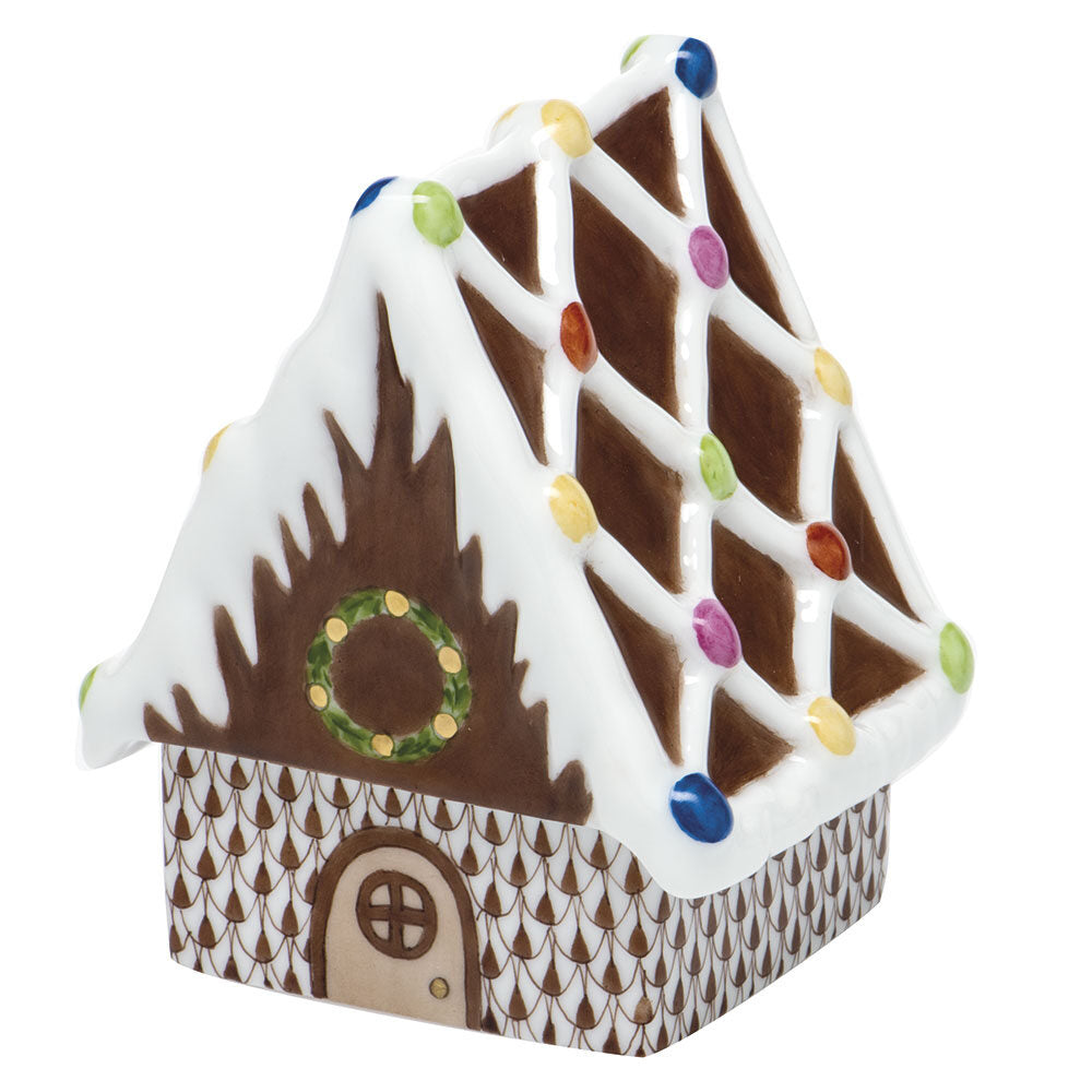 Hand-painted Herend Gingerbread House Figurine in Chocolate fishnet porcelain on a white background