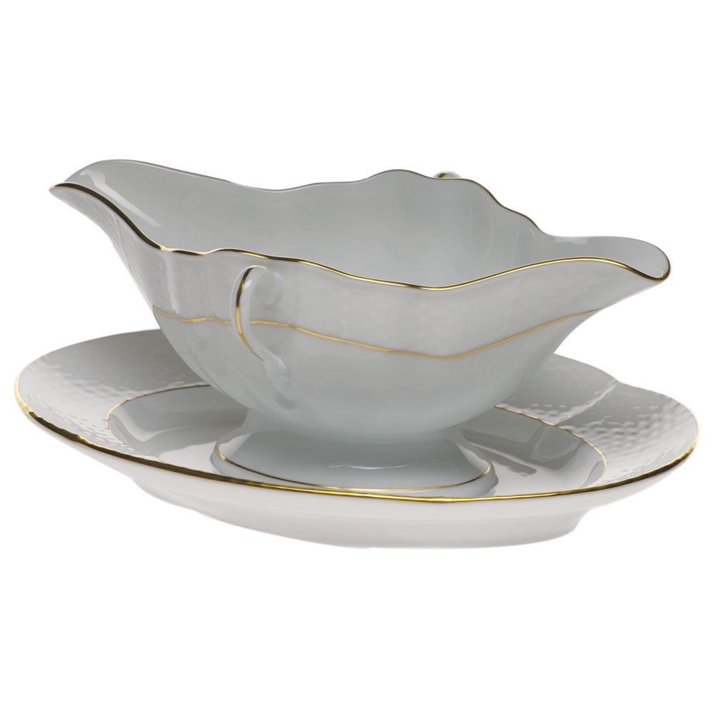 Hand-painted Herend Golden Edge Gravy Boat with Fixed Stand in fine porcelain, on a white background