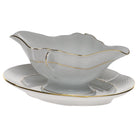 Hand-painted Herend Golden Edge Gravy Boat with Fixed Stand in fine porcelain, on a white background