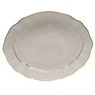 Hand-painted Herend Golden Edge Oval Dish in fine porcelain, 8.25in L X 6.75in W, on a white background
