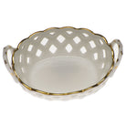 Hand-painted Herend Golden Edge Sm Openwork Basket with Handle in fine porcelain, 3.5in L X 2.5in W, on a white background