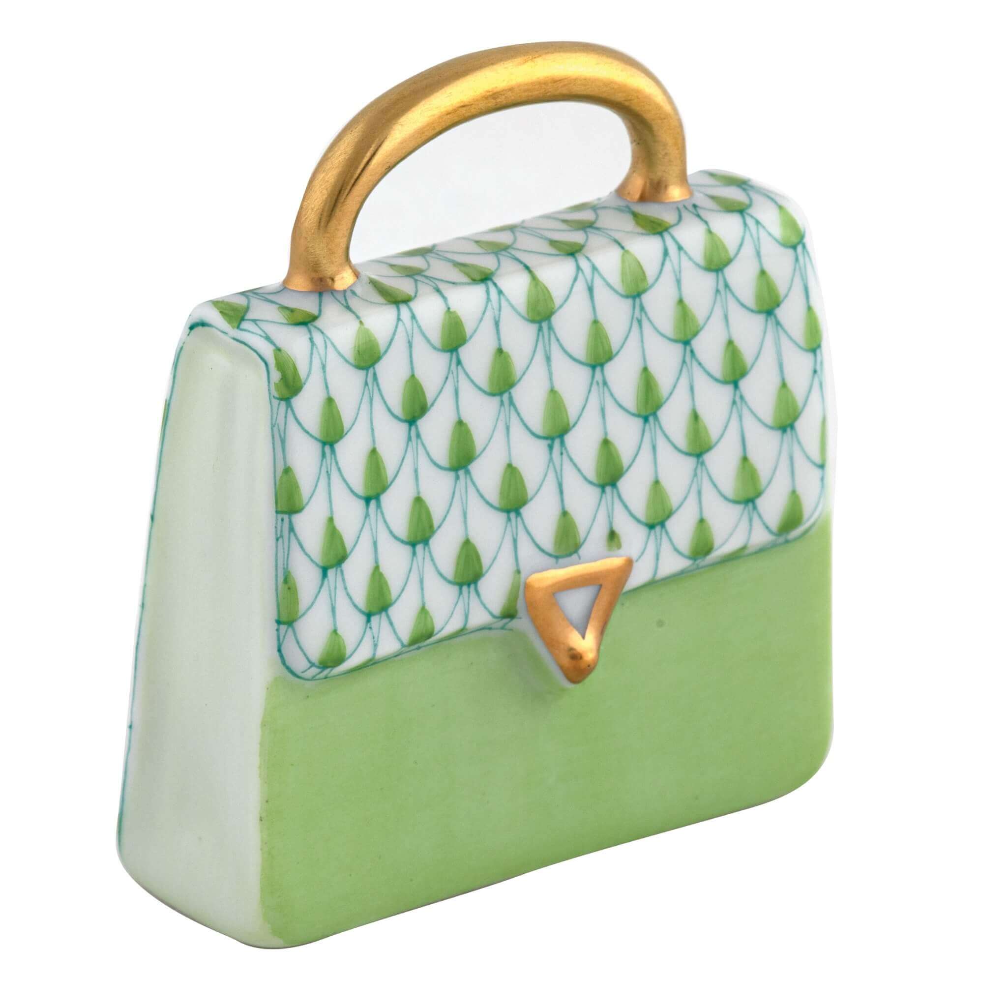 Herend Handbag figurine in Keylime with key lime green fishnet pattern with gold accents on a white background