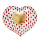 Hand-painted Herend Heart of Gold Figurine in Rust fishnet porcelain on a white background