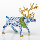 Hand-painted Herend Holiday Reindeer Figurine in Sapphire fishnet porcelain on a white background