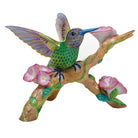Hand-painted Herend Hummingbird on Flowered Branch Figurine in fine porcelain, 8.25in L X 7.75in W X 5.75in H, on a white background
