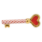 Hand-painted Herend Key To My Heart Figurine in Rust fishnet porcelain on a white background