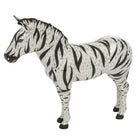 Hand-painted Herend Large Zebra Figurine in fine porcelain, 6.75in L X 5.75in H, on a white background