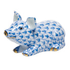 Hand-painted Herend Little Pig Lying Figurine in Blue fishnet porcelain on a white background