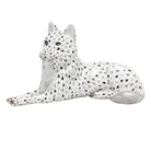 Hand-painted Herend Lying Wolf Figurine in fine porcelain, 7.75in L X 4.25in H, on a white background