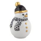 Decorative snowman figurine with a black and gold hat and a patterned scarf on a white background