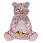 Hand-painted Herend Miniature Baby Bear Sitting Figurine in Raspberry fishnet porcelain on a white background