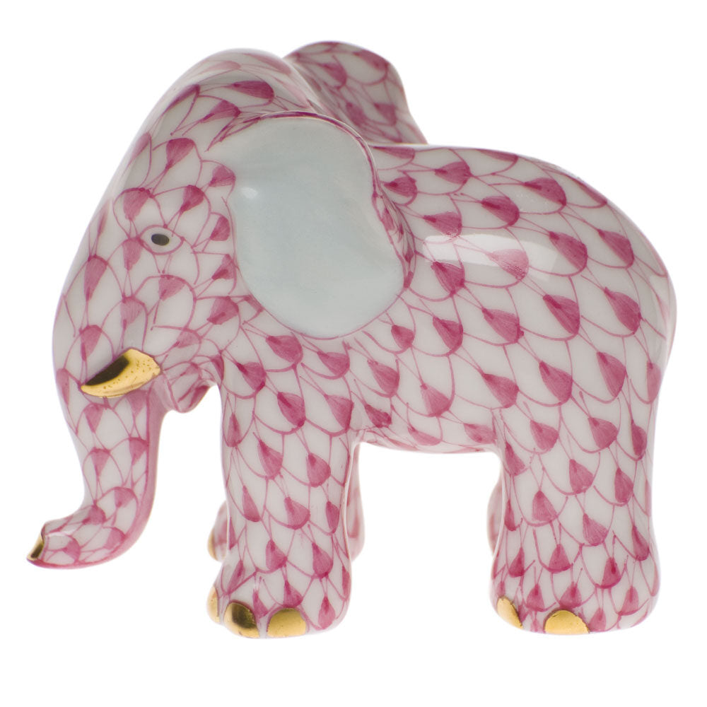 Hand-painted Herend Miniature Elephant Figurine in Raspberry fishnet porcelain on a white background