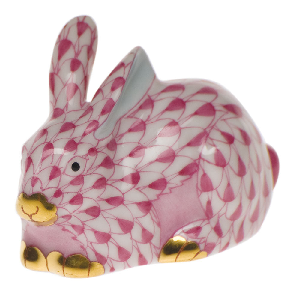 Hand-painted Herend Miniature Lying Rabbit Figurine in Raspberry fishnet porcelain on a white background