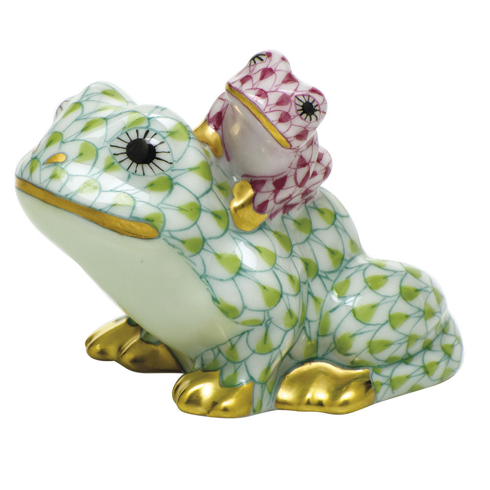 Hand-painted Herend Mother and Baby Frog Figurine in Key Lime-Raspberry fishnet porcelain on a white background