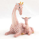 Hand-painted Herend Mother and Baby Giraffe Figurine in Rust fishnet porcelain on a white background