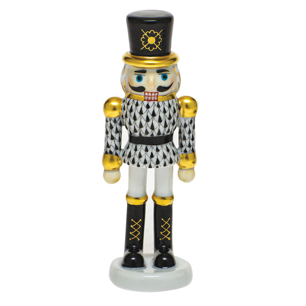 Hand-painted Herend Nutcracker Figurine in Black fishnet porcelain on a white background