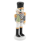 Herend Nutcracker with Christmas Tree figurine in Black with black fishnet pattern with gold accents on a white background