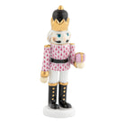 Herend Nutcracker with Gift Figurine porcelain figurine painted in the Raspberry fishnet pattern