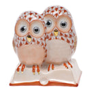 Hand-painted Herend Pair of Owls on Book Figurine in Rust fishnet porcelain on a white background