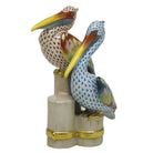Hand-painted Herend Pelicans on Pier Figurine in fine porcelain, 6.25in L X 8in H, on a white background