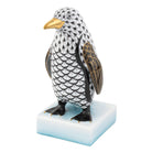 Hand-painted Herend Penguin Figurine in Black fishnet porcelain on a white background