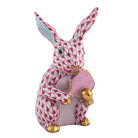 Hand-painted Herend Pickleball Bunny Figurine in Raspberry fishnet porcelain on a white background