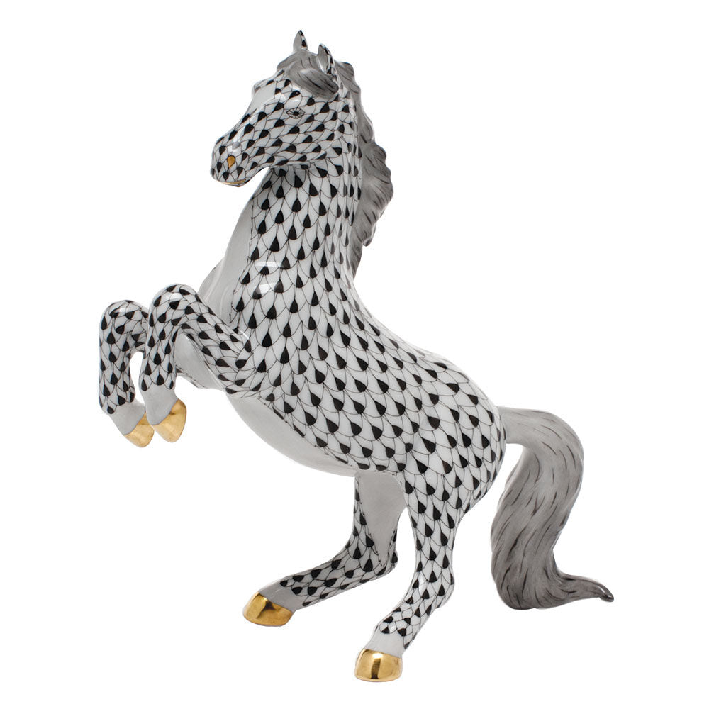 Hand-painted Herend Prancing Horse Figurine in fine porcelain, 6.5in L X 7.25in H, on a white background