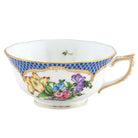 Hand-painted Herend Printemps Blue Border Tea Cup Cup & Saucer Set in fine porcelain, on a white background